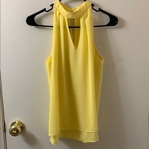 Yellow sleeveless top